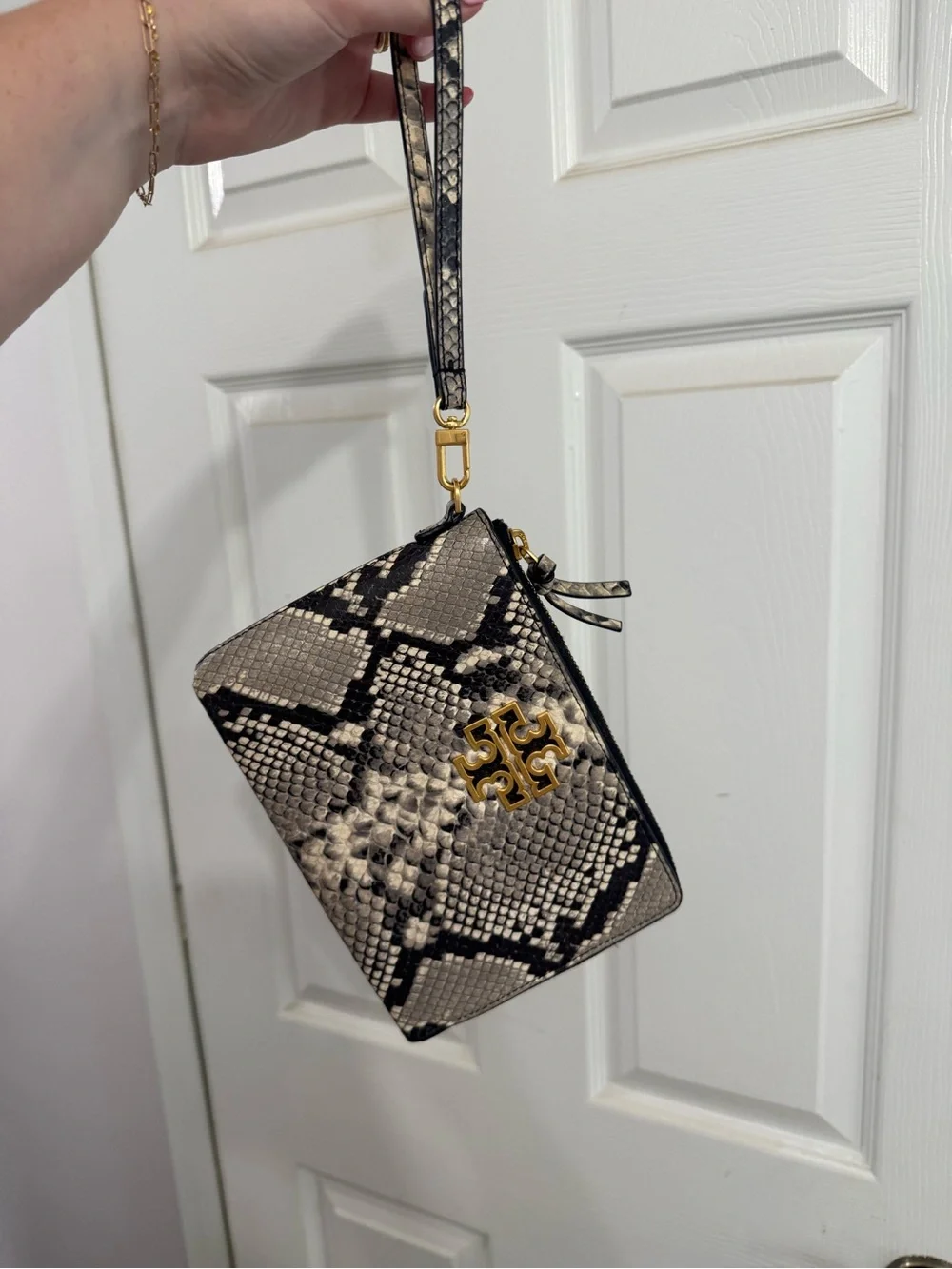 Tory Burch Snake-Print Wristlet in Black and Cream with Gold Logo